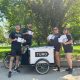 event staff around bicycle perfect team
